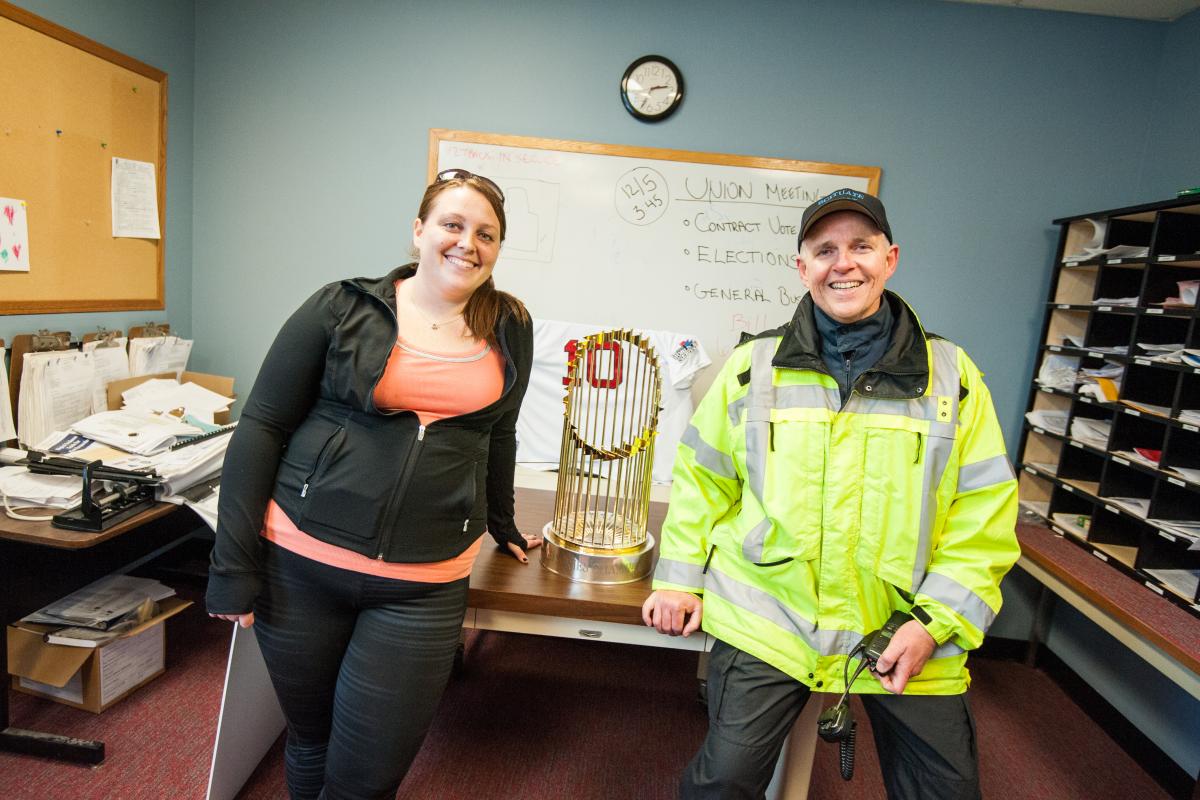 Department Personnel with World Series Trophy